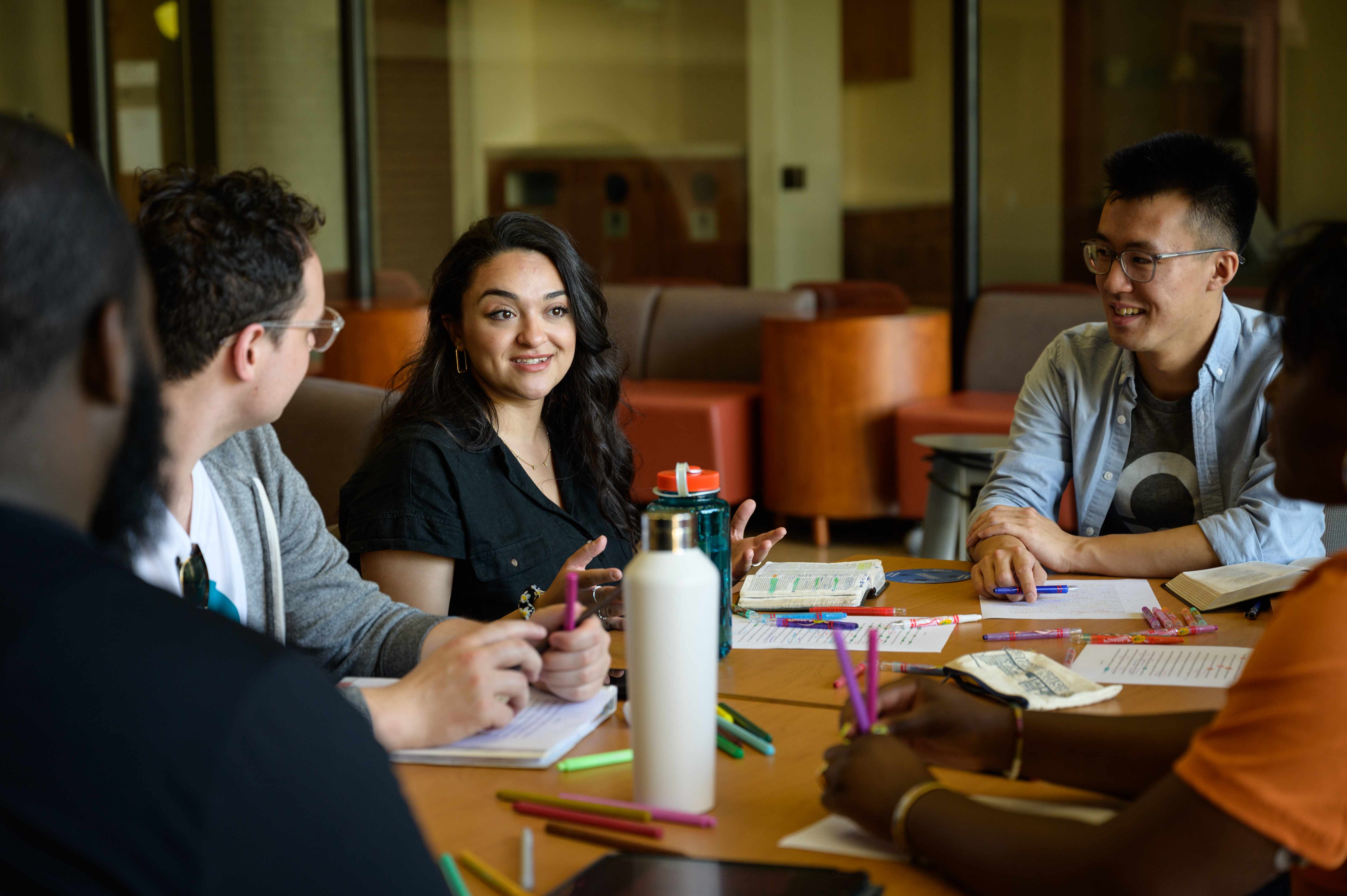 student studying scripture together